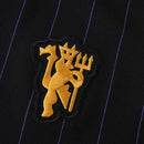 MANCHESTER UNITED ENTRANIMENTO BLACK RETRO 25/26 MEN